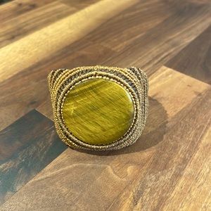 Bohemian handmade Macrame cuff-style bracelet with beautiful Tiger Eye stone.